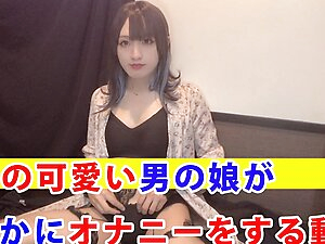 This is a video of a cute black-haired girl masturbating quietly