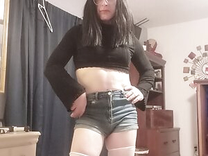 Shaved crossdresser in black panties