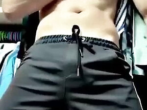 Teen playing his dick in the closet