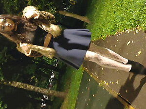 Sissy girl walking in the street in high heels