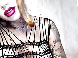 Tattooed Shemale Loves To Show