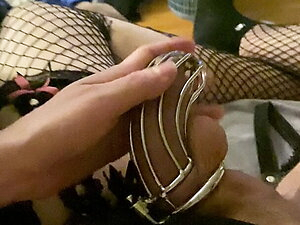Mistress tortures her caged cock